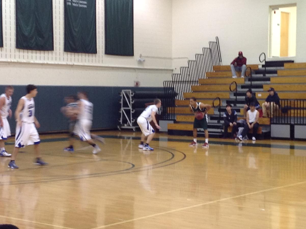 Photo for MEN'S BASKETBALL UPENDS NOR'EASTERS IN 90-52 VICTORY image 7