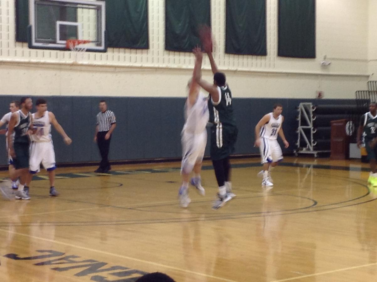 Photo for MEN'S BASKETBALL UPENDS NOR'EASTERS IN 90-52 VICTORY image 8