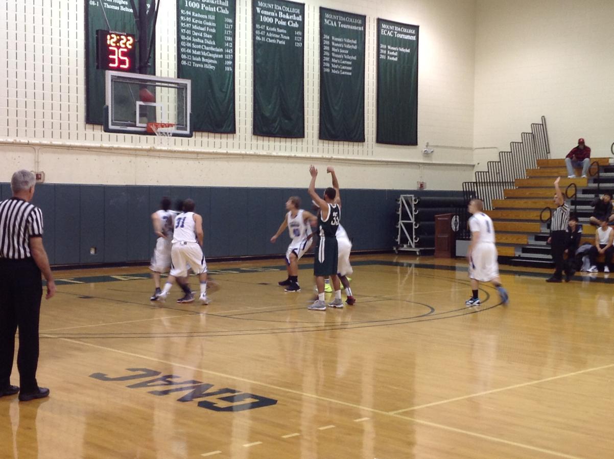 Photo for MEN'S BASKETBALL UPENDS NOR'EASTERS IN 90-52 VICTORY image 10