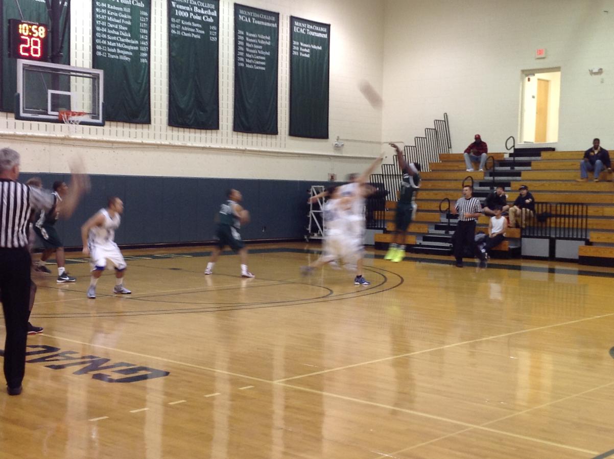 Photo for MEN'S BASKETBALL UPENDS NOR'EASTERS IN 90-52 VICTORY image 11