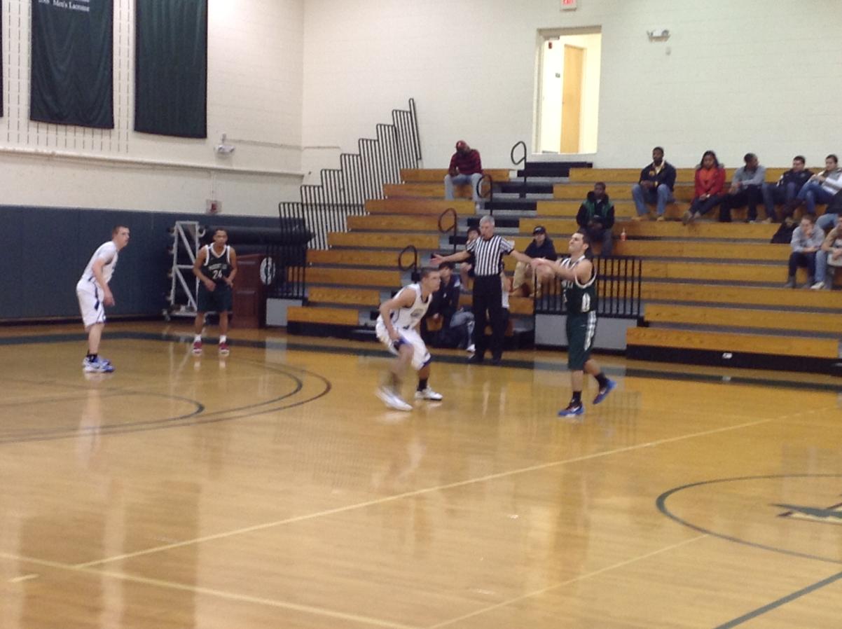 Photo for MEN'S BASKETBALL UPENDS NOR'EASTERS IN 90-52 VICTORY image 13