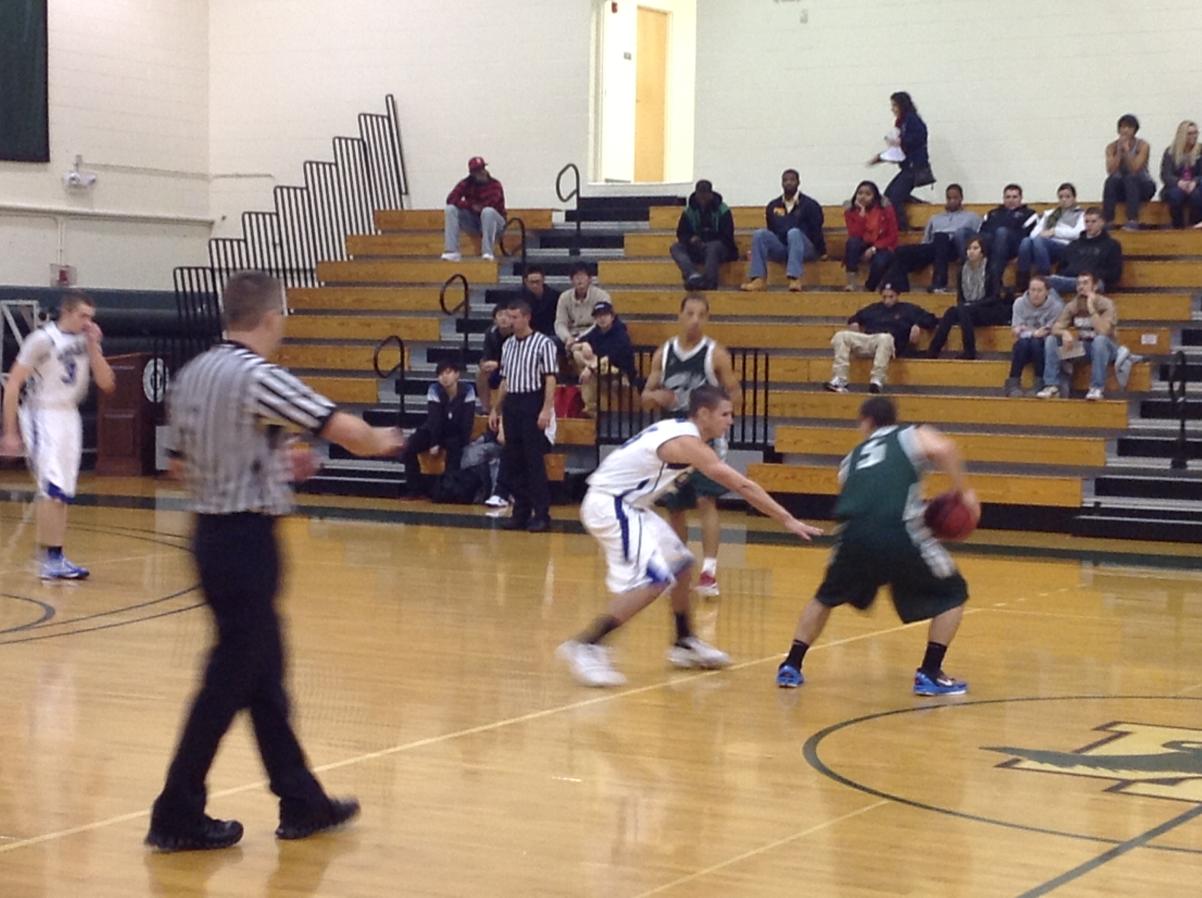 Photo for MEN'S BASKETBALL UPENDS NOR'EASTERS IN 90-52 VICTORY image 14