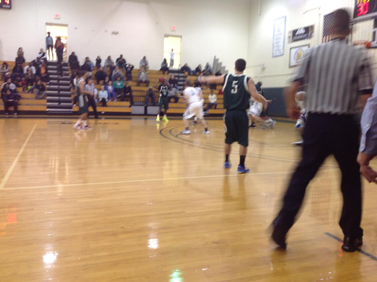 Photo for MEN'S BASKETBALL UPENDS NOR'EASTERS IN 90-52 VICTORY image 17