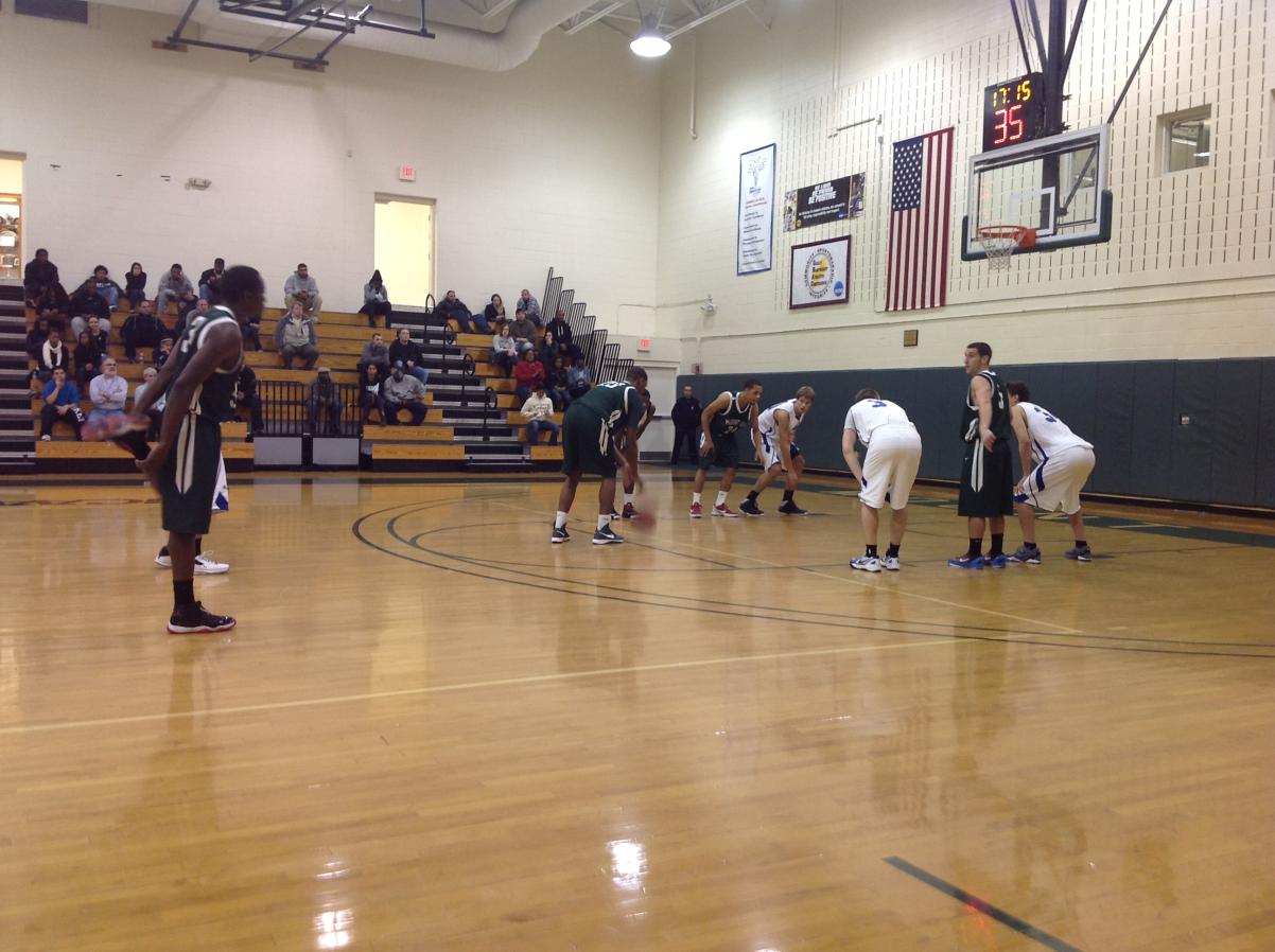 Photo for MEN'S BASKETBALL UPENDS NOR'EASTERS IN 90-52 VICTORY image 18