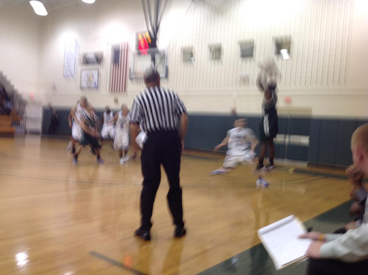 Photo for MEN'S BASKETBALL UPENDS NOR'EASTERS IN 90-52 VICTORY image 20