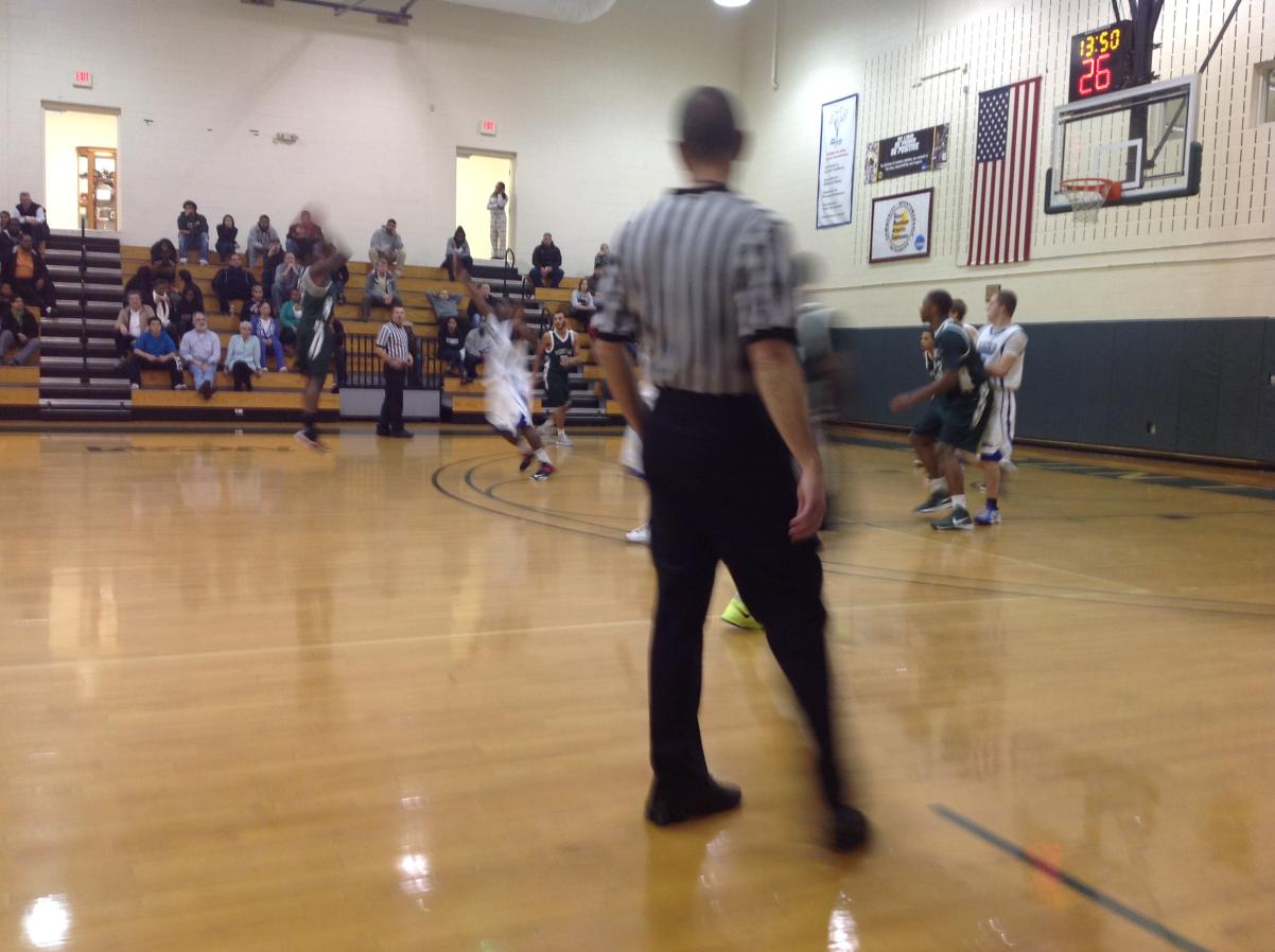 Photo for MEN'S BASKETBALL UPENDS NOR'EASTERS IN 90-52 VICTORY image 22