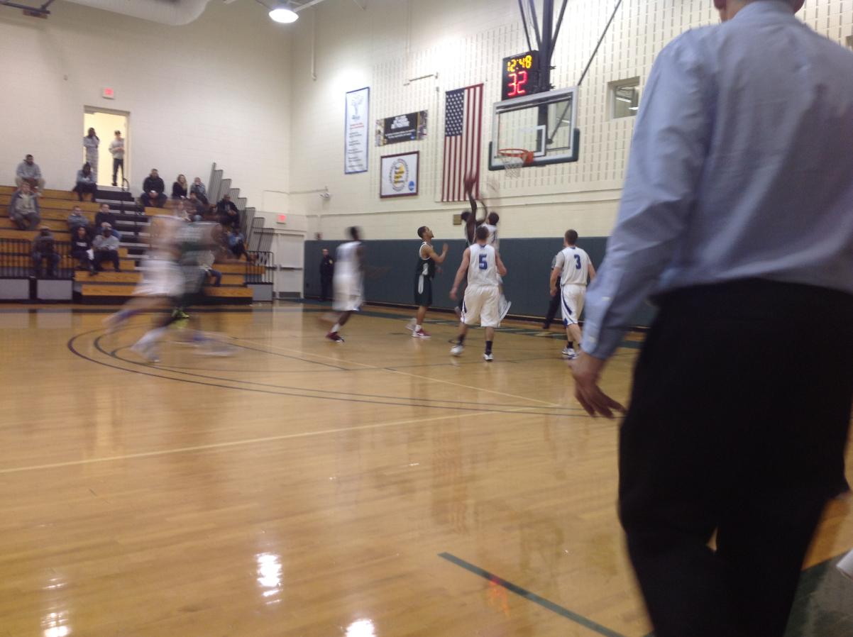 Photo for MEN'S BASKETBALL UPENDS NOR'EASTERS IN 90-52 VICTORY image 26