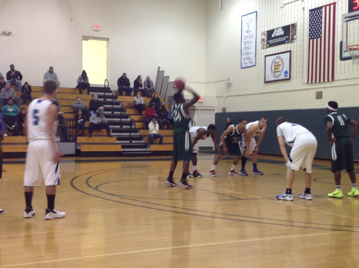 Photo for MEN'S BASKETBALL UPENDS NOR'EASTERS IN 90-52 VICTORY image 28