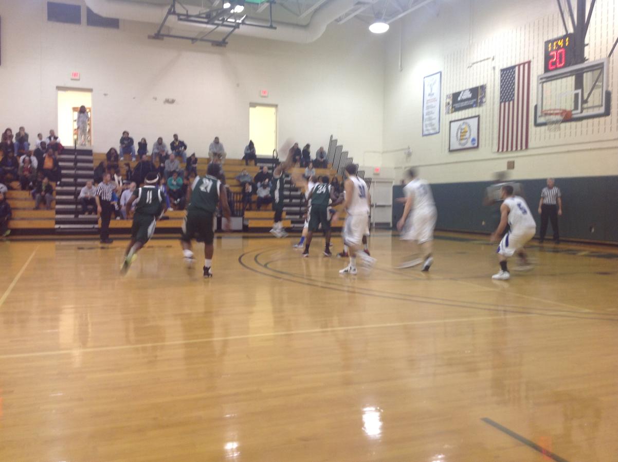 Photo for MEN'S BASKETBALL UPENDS NOR'EASTERS IN 90-52 VICTORY image 30