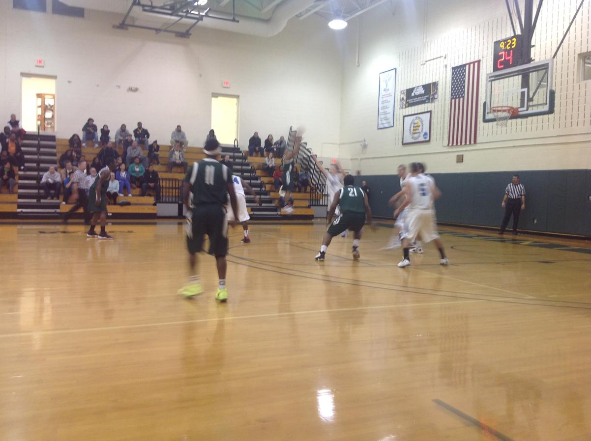 Photo for MEN'S BASKETBALL UPENDS NOR'EASTERS IN 90-52 VICTORY image 31