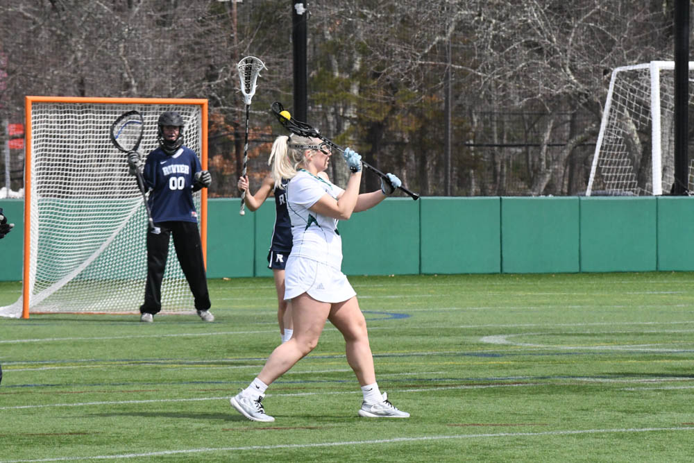 Photo for Kelly Ties School Single-Match Scoring Record As Women's Lacrosse Notches 20-9 GNAC Triumph Over Rivier image 3