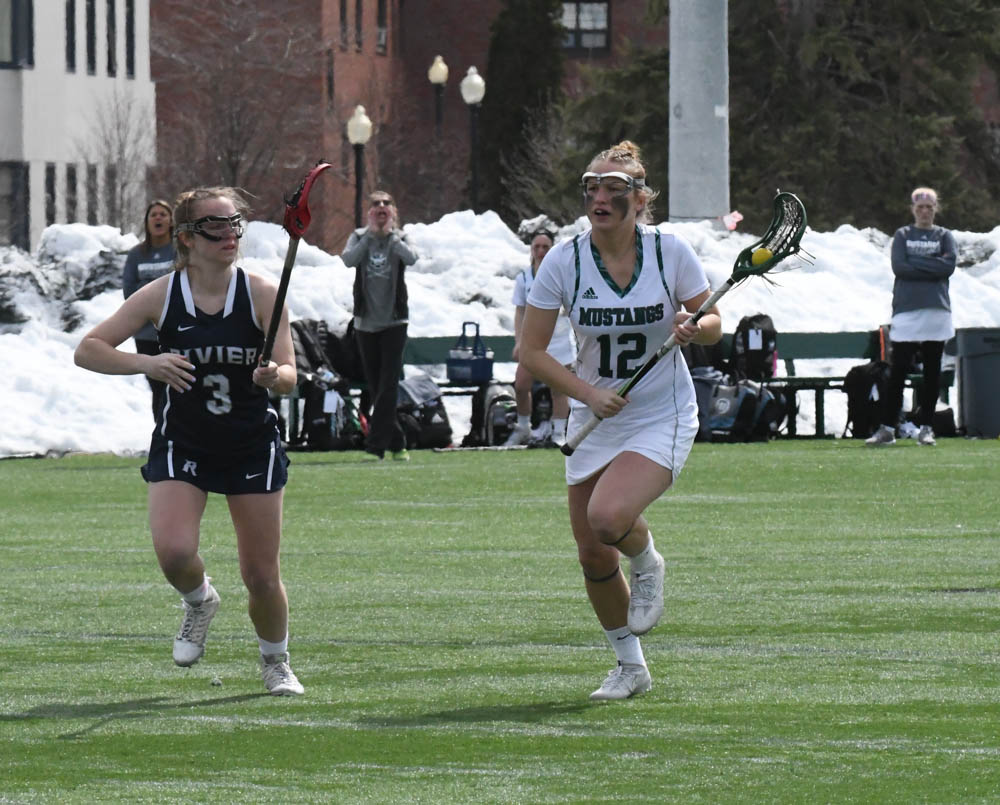 Photo for Kelly Ties School Single-Match Scoring Record As Women's Lacrosse Notches 20-9 GNAC Triumph Over Rivier image 7