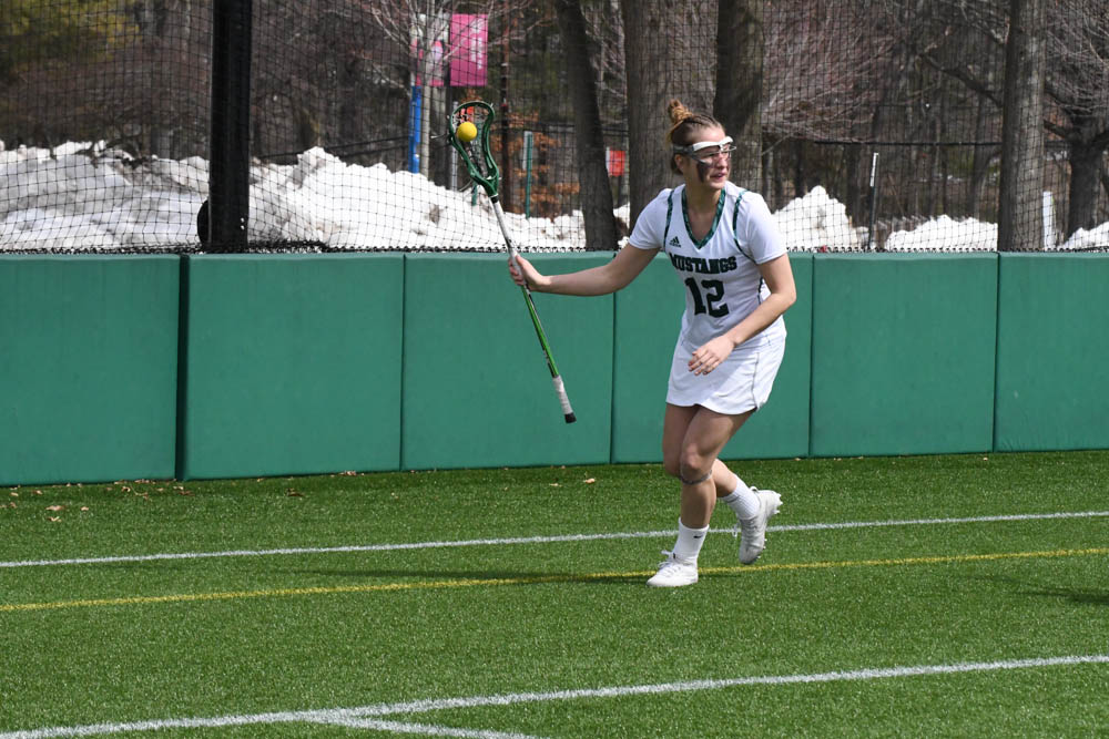 Photo for Kelly Ties School Single-Match Scoring Record As Women's Lacrosse Notches 20-9 GNAC Triumph Over Rivier image 8