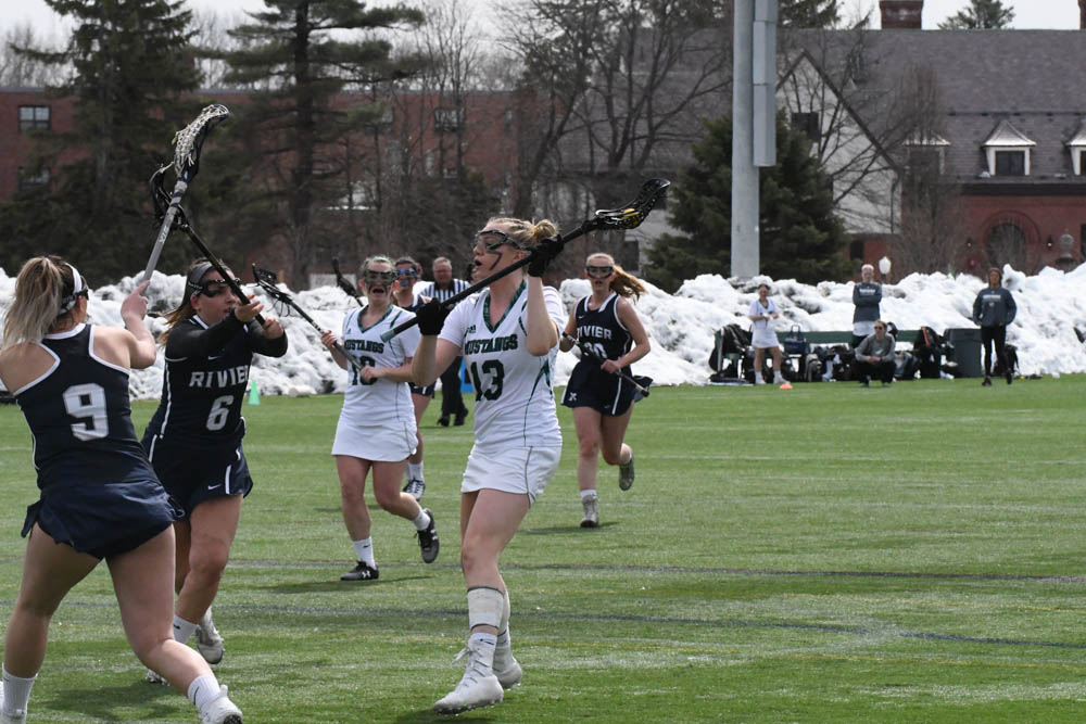 Photo for Kelly Ties School Single-Match Scoring Record As Women's Lacrosse Notches 20-9 GNAC Triumph Over Rivier image 12