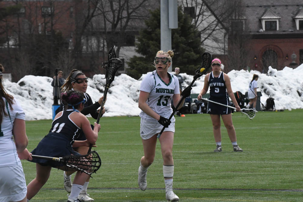 Photo for Kelly Ties School Single-Match Scoring Record As Women's Lacrosse Notches 20-9 GNAC Triumph Over Rivier image 13