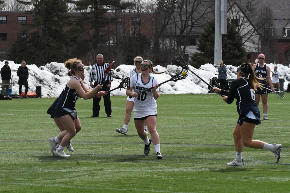 Photo for Kelly Ties School Single-Match Scoring Record As Women's Lacrosse Notches 20-9 GNAC Triumph Over Rivier image 14