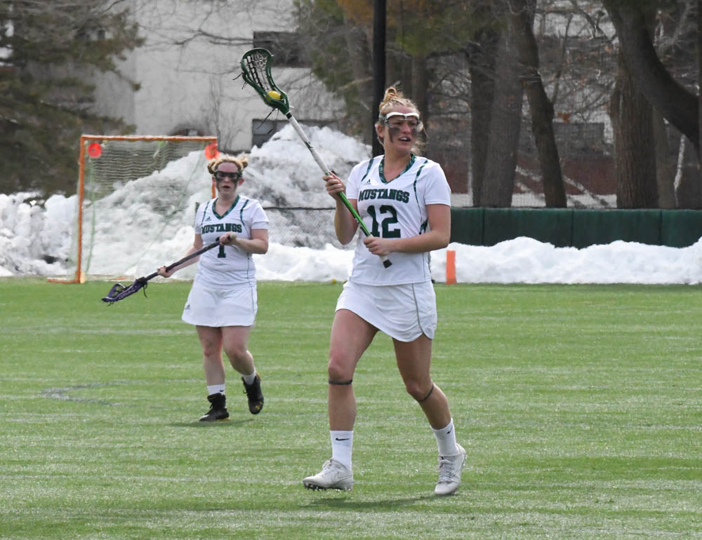 Photo for Kelly Ties School Single-Match Scoring Record As Women's Lacrosse Notches 20-9 GNAC Triumph Over Rivier image 15