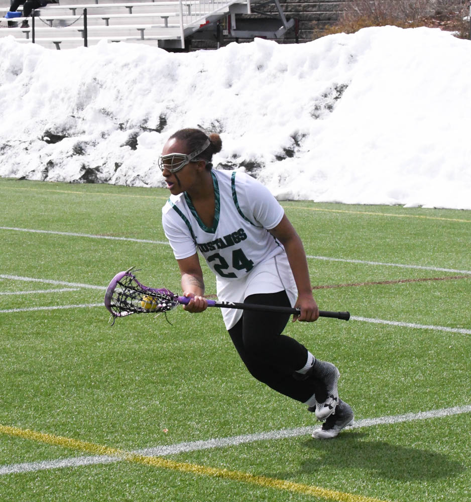 Photo for Kelly Ties School Single-Match Scoring Record As Women's Lacrosse Notches 20-9 GNAC Triumph Over Rivier image 16