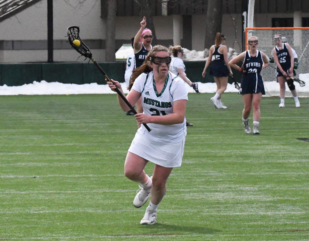 Photo for Kelly Ties School Single-Match Scoring Record As Women's Lacrosse Notches 20-9 GNAC Triumph Over Rivier image 18