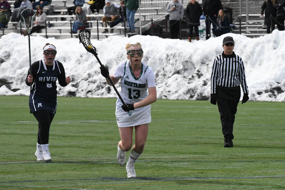 Photo for Kelly Ties School Single-Match Scoring Record As Women's Lacrosse Notches 20-9 GNAC Triumph Over Rivier image 19