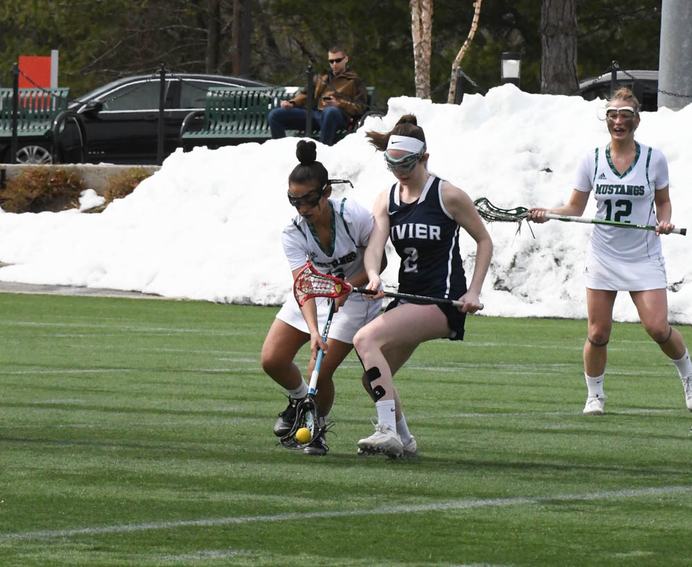 Photo for Kelly Ties School Single-Match Scoring Record As Women's Lacrosse Notches 20-9 GNAC Triumph Over Rivier image 22