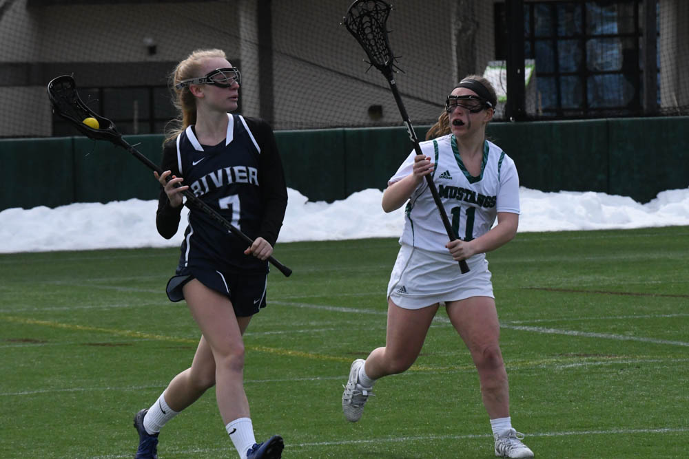 Photo for Kelly Ties School Single-Match Scoring Record As Women's Lacrosse Notches 20-9 GNAC Triumph Over Rivier image 24
