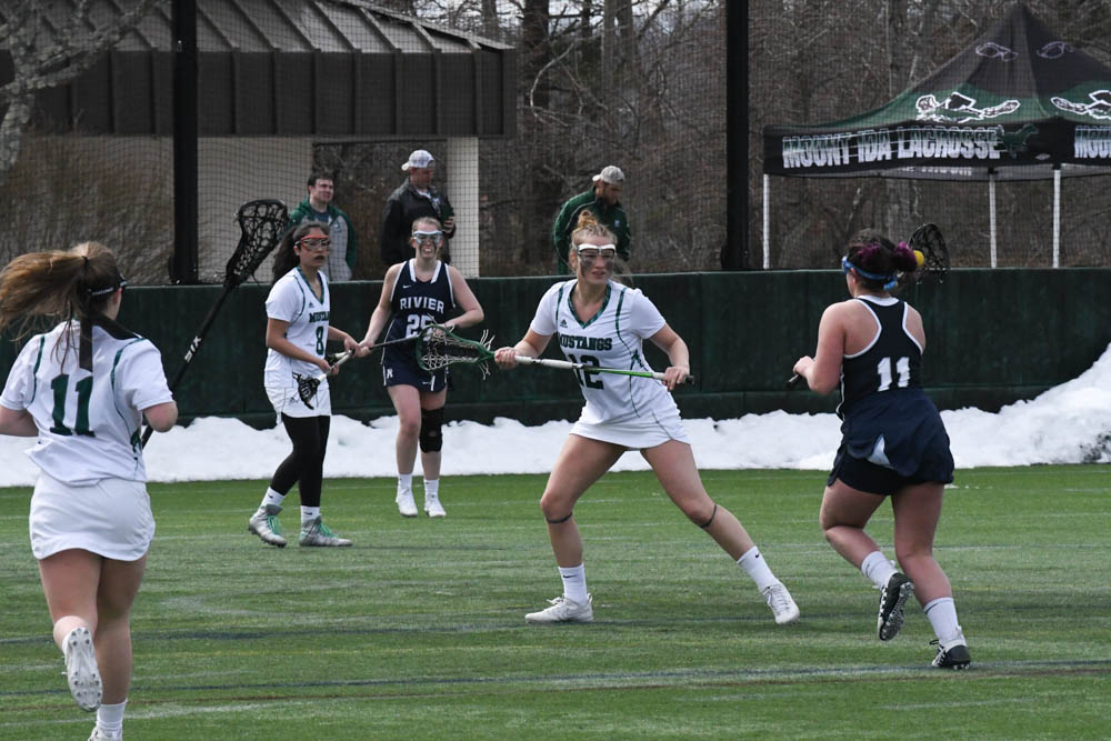 Photo for Kelly Ties School Single-Match Scoring Record As Women's Lacrosse Notches 20-9 GNAC Triumph Over Rivier image 26