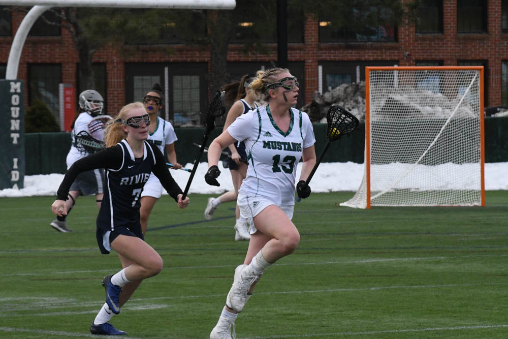 Photo for Kelly Ties School Single-Match Scoring Record As Women's Lacrosse Notches 20-9 GNAC Triumph Over Rivier image 29
